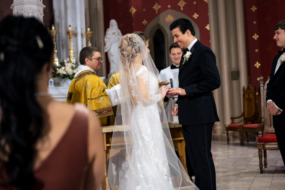 The New Orleans couple recite their vows during a Louisiana church wedding ceremony A wedding ceremony picture of a New Orleans bride and groom during their vow exchange inside a Louisiana church