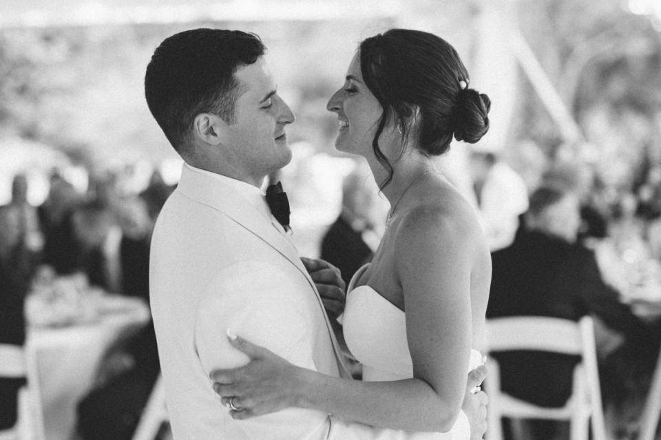The bride and groom dance romantically at their Edgewater, Maryland wedding