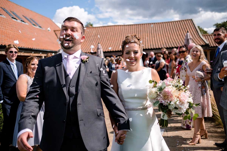 Easton Grange wedding reportage photography Easton Grange wedding photo of the bride and groom after the ceremony.