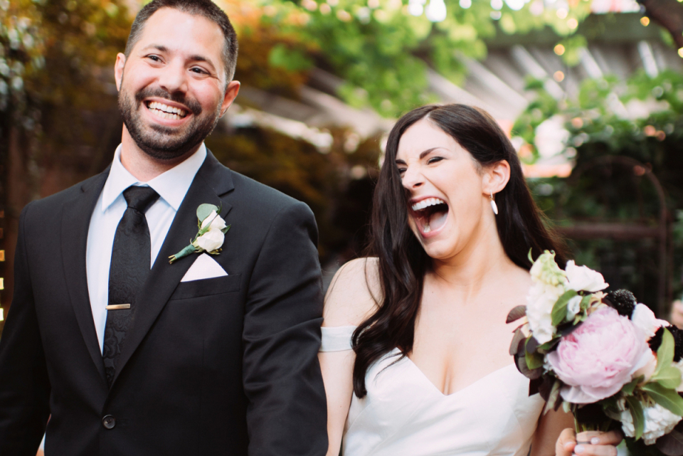 PA Bride and Groom laughing image from a wedding day in Pittsburgh PA Southside Bride and Groom laughing together on their wedding day in Pittsburgh Pennsylvania