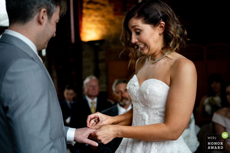 Bride and groom during their vows Bride and groom during their vows at Bartholomew Barns | East Sussex wedding photographer