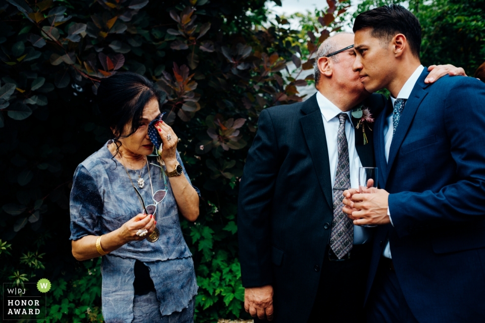 image of the Mother and father of the groom getting emotional in Widcombe Grange Mother and father of the groom get emotional in Widcombe Grange