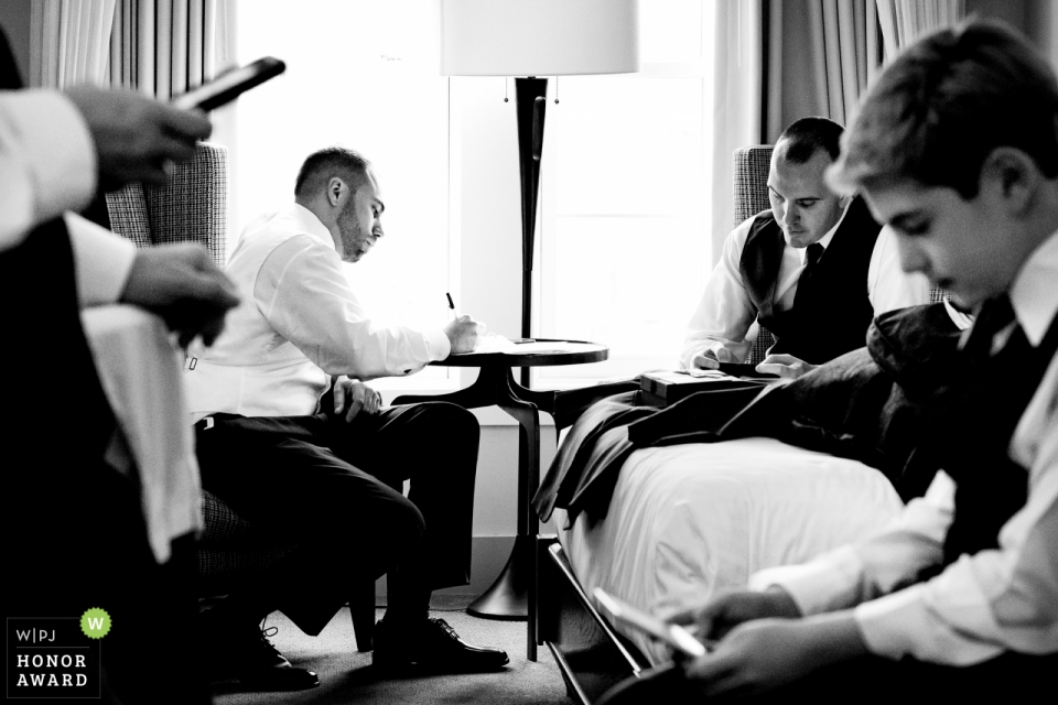 Photo by: <a href="https://www.wpja.com/contests/2018-v17-photography-competition/best-wedding-photographers/2339721">Johnny Shryock - Arlington Virginia</a> Wedding photo of men gettting ready before ceremony at Chesapeake Bay Beach Club, Maryland
