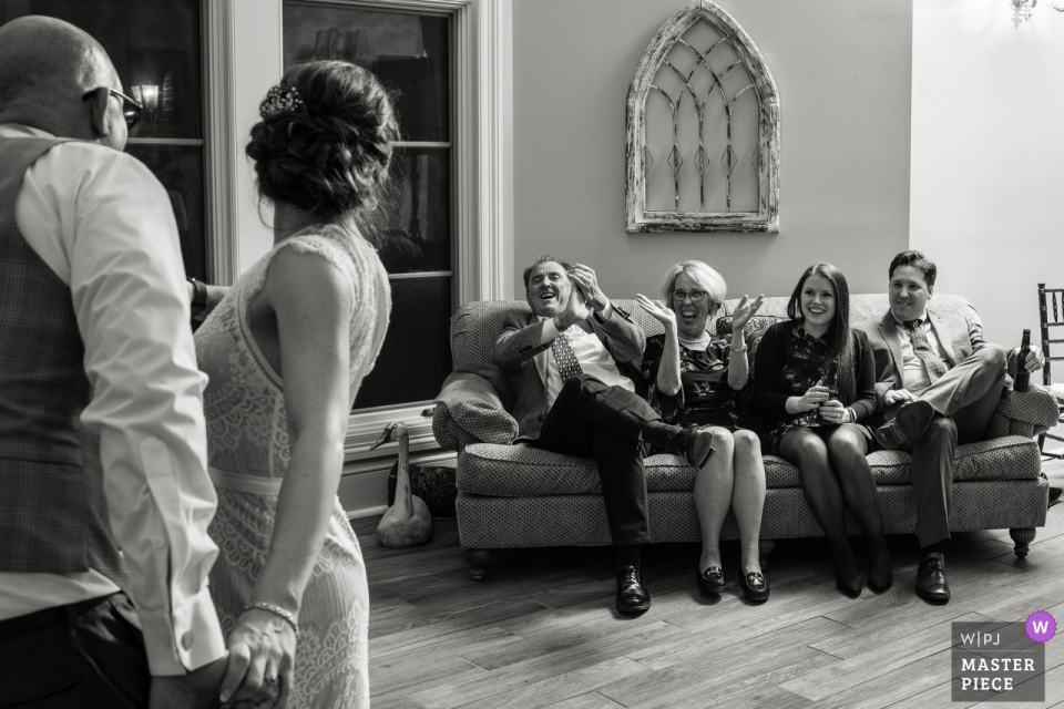 Photo by: <a href="https://www.wpja.com/contests/2018-v19/best-wedding-photographers/2376486">Carl Bower - Denver Colorado</a> Great Oak Manor, Chestertown, Maryland | Wedding reception photos of guests seated during dancing