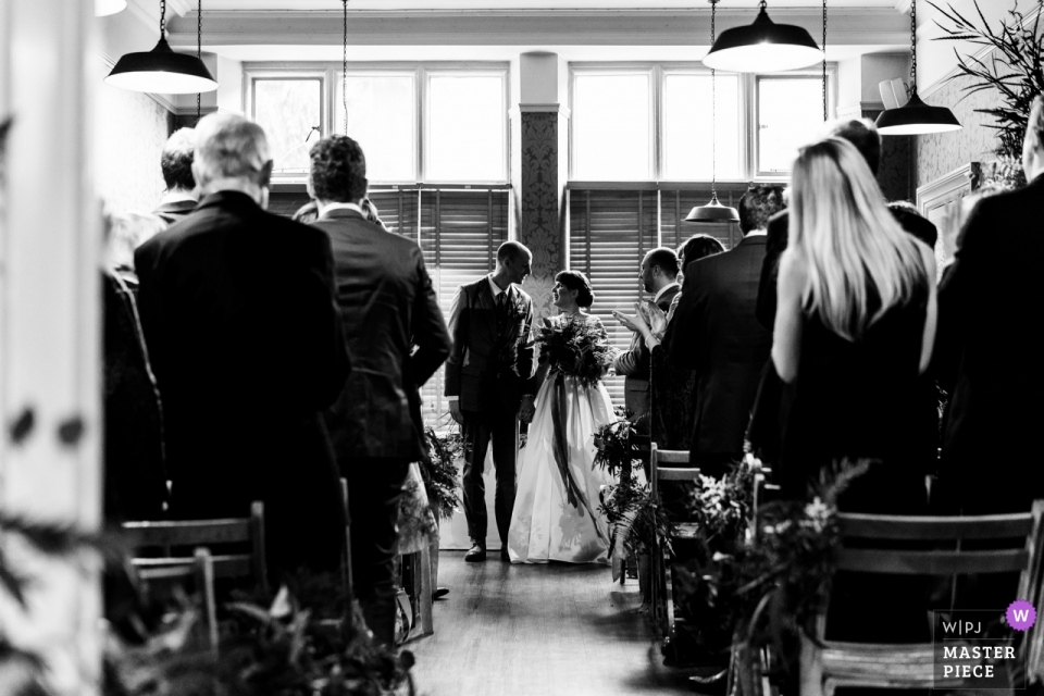 The William Cecil at Stamford - indoor wedding ceremony photograph of the bride and groom