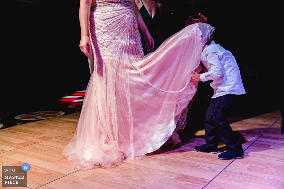 Photo by: <a href="https://www.wpja.com/contests/2019-v09/best-wedding-photographers/2539266">Serenay Lokcetin - Antalya</a> Istanbul-Green Park Wedding Photojournalism - Bride Dancing with crazy children