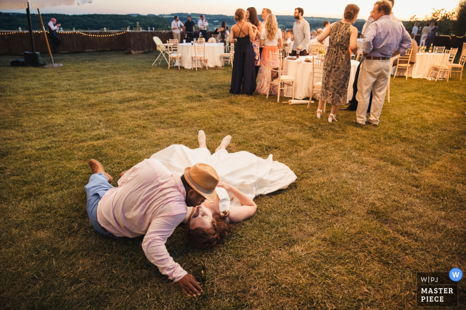 Photo by: <a href="https://www.wpja.com/contests/2019-v09/best-wedding-photographers/2541266">Isabelle Bazin - Goutz </a> Calstelnau des Fieumarcon Wedding Photojournalism - After the ceremony the couple kisse