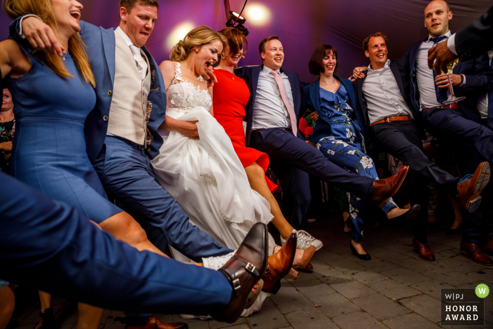 Bride Dancing with friends Delden - Hoeve de Haer, wedding venue picture | Bride Dancing with friends