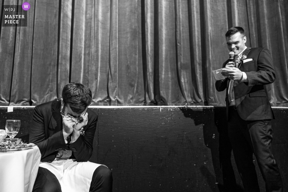 Groom laughing during his brother's speech The Orpheum wedding venue | Groom laughing during his brother's speech