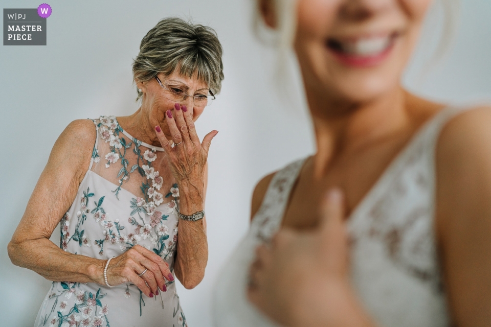 Bride's mother crying when seeing her in the dress Ashfield House Wedding Photos - Bride's mum crying when seeing her in the dress