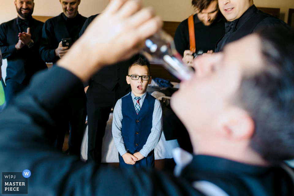 Photo by: <a href="https://www.wpja.com/contests/2019-v16/best-wedding-photographers/2560947">Alex Paul - Boston Massachusetts</a> Wychmere Beach Club, Cape Cod, MA wedding photography | Boy looking at some weird adults wedding traditions