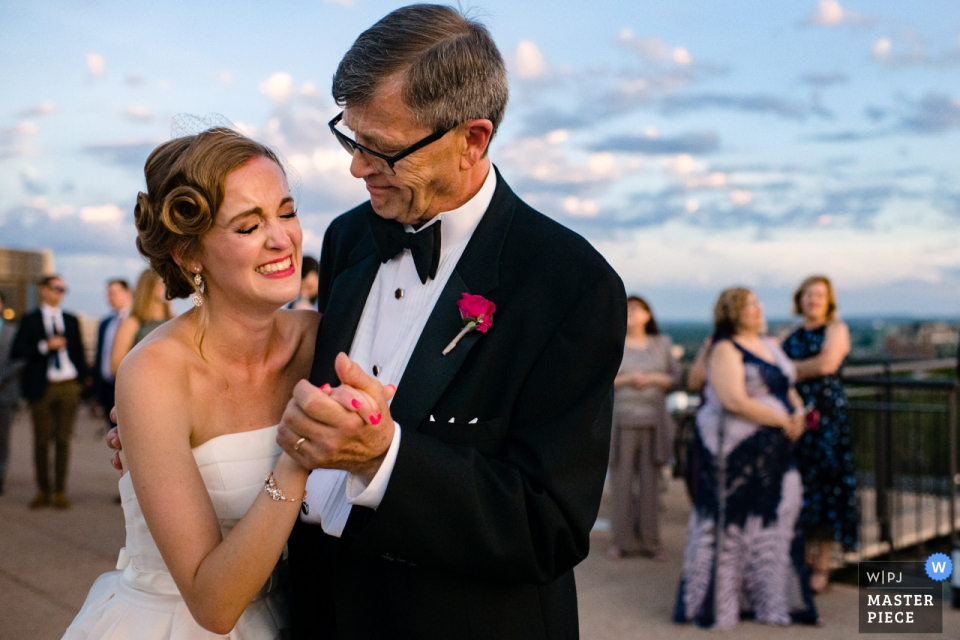 the Father Daughter dance outdoors Edgewater Hotel Madison wedding venue photography showing the Father Daughter dance