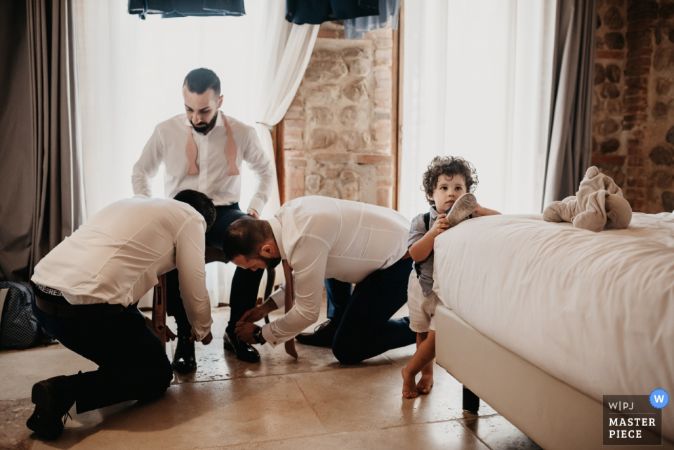 Photo by: <a href="https://www.wpja.com/contests/2019-v19/best-wedding-photographers/2571279">Catherine Hudson-Paturet - Font-Romeu </a> Reception venue photo, Domaine Mas Conte, Perpignan - the Groom getting ready with best men and Godson