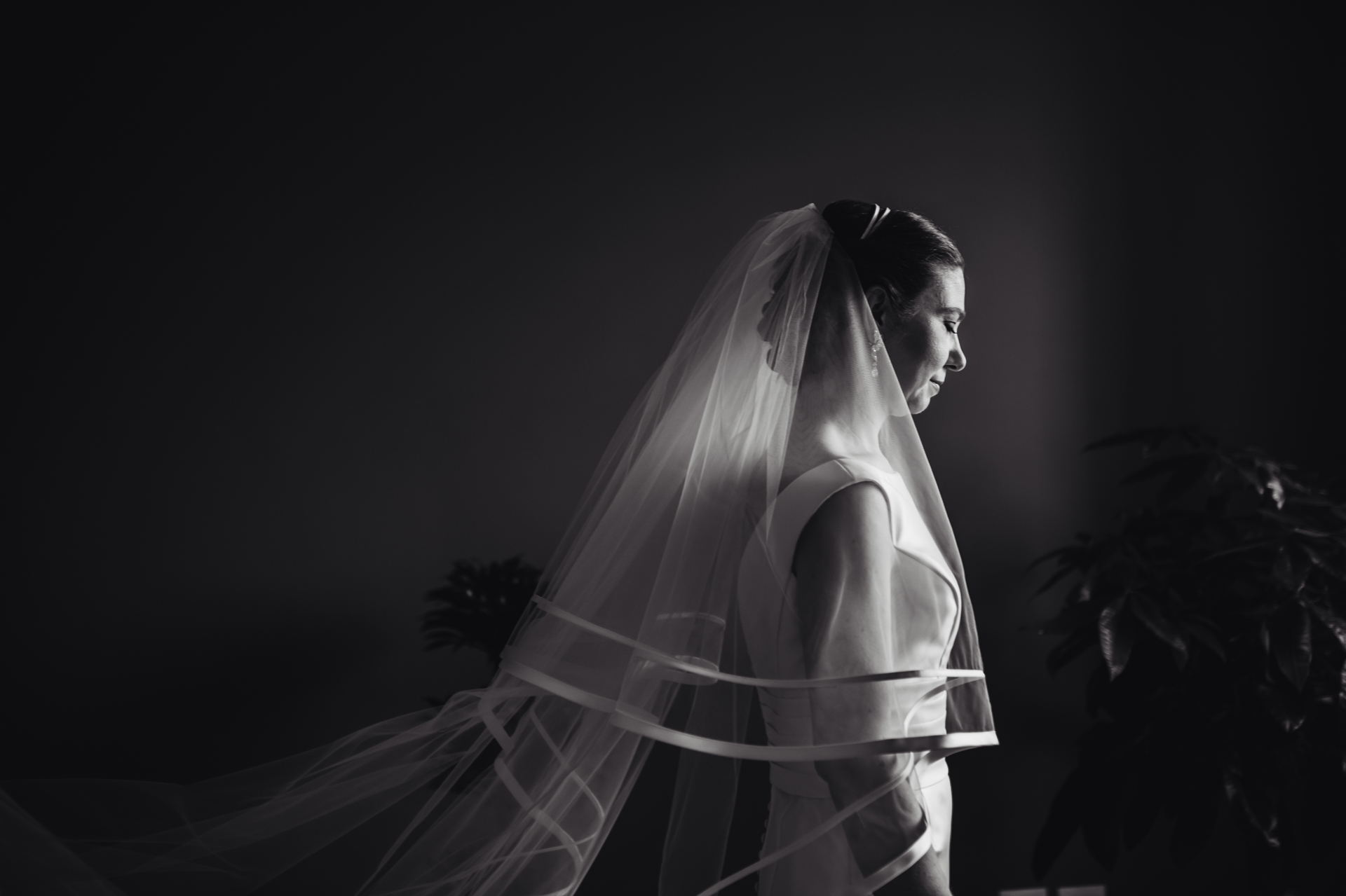 Florence Wedding Bridal Picture - the bride takes a moment to herself as she stands with her eyes closed and her long veil fanned out behind her Florence, Tuscany Elopement Bridal Image | At last the bride is ready to go to the ceremony