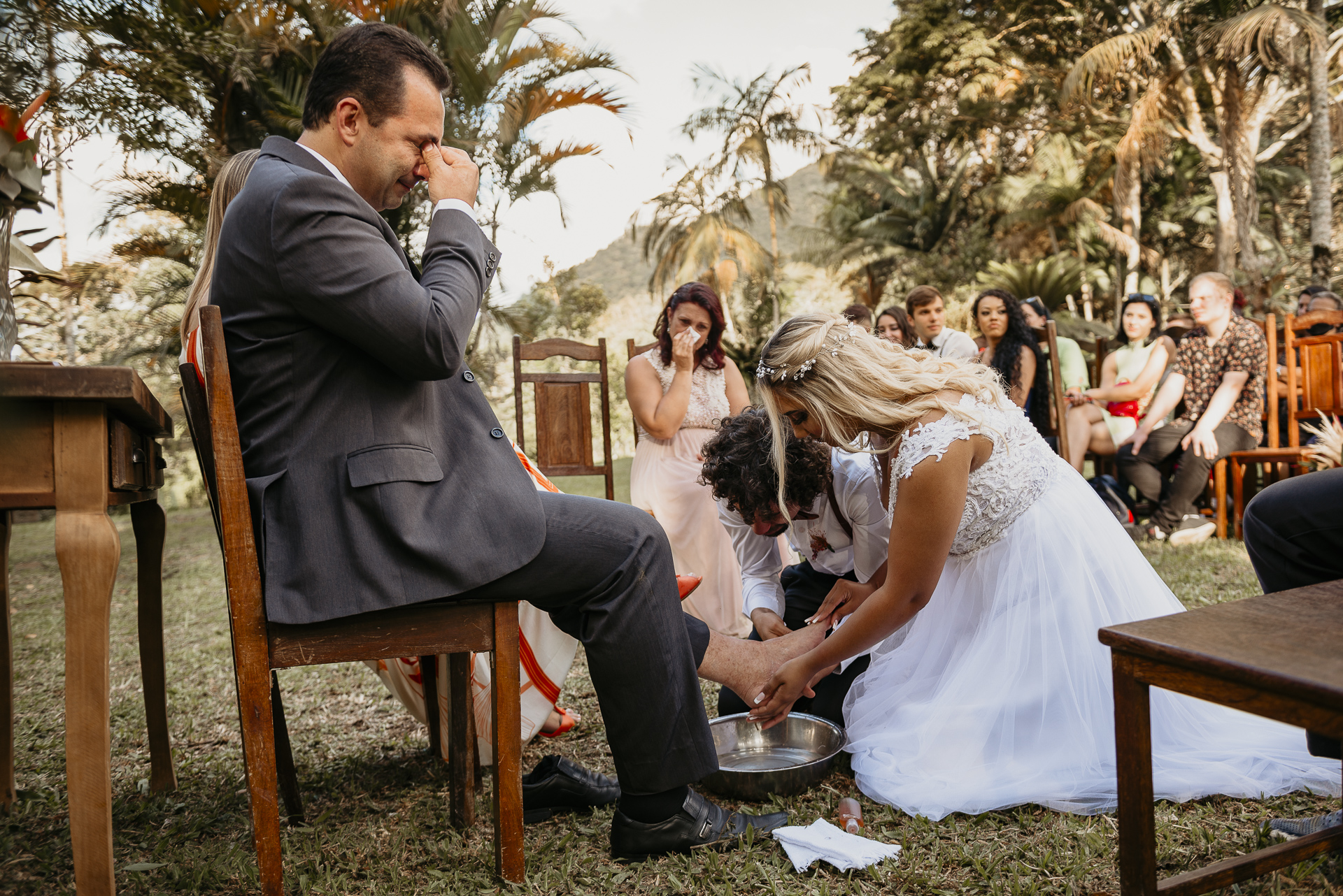 Christian Elopement Photographer - Honoring the pastor and commiting themselves to the church that they attend Top Rio de Janeiro Religious Wedding Photography | The bride and groom conduct a foot washing ceremony
