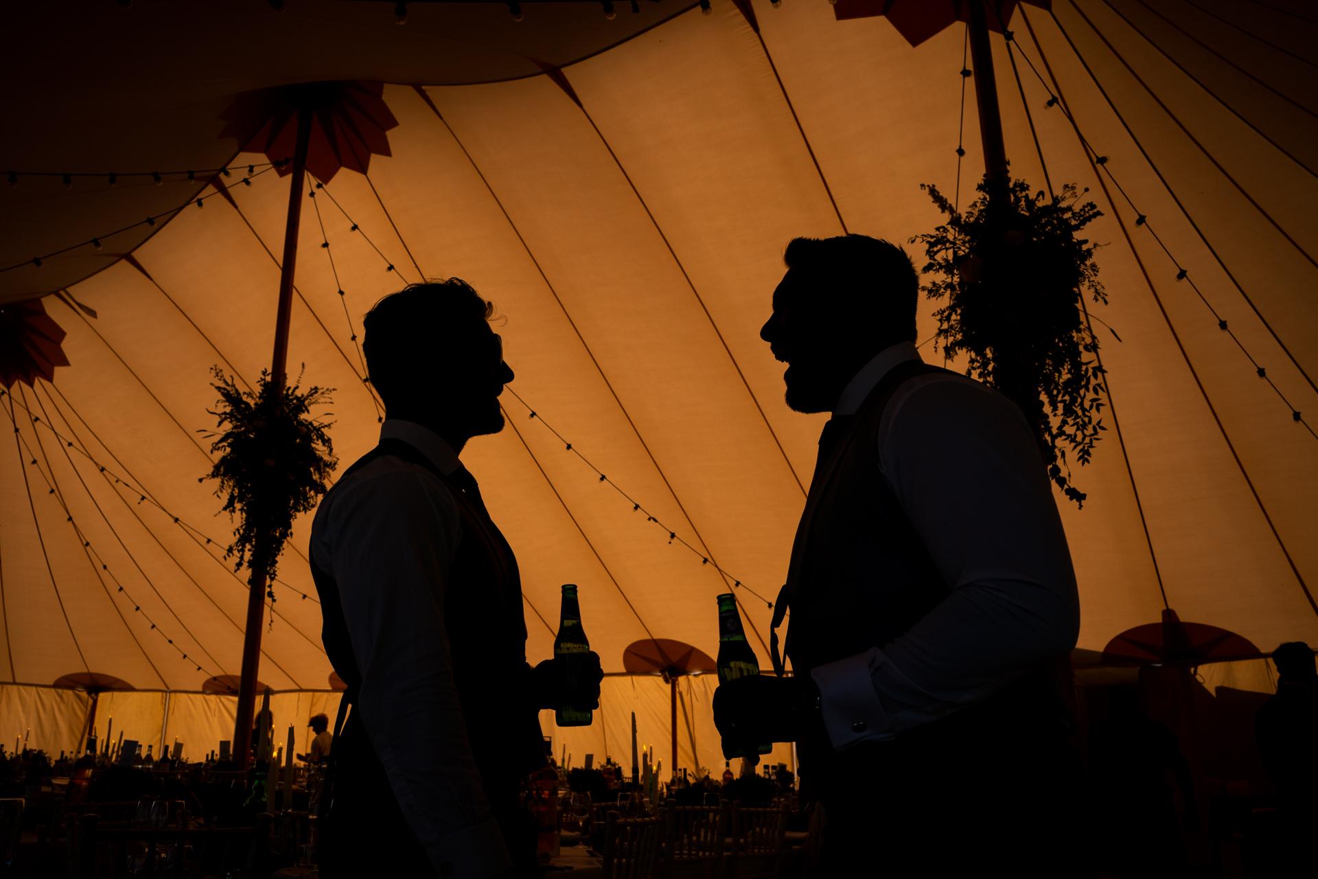 Wedding tent photos showing the contrasts with darker subjects, resulting in great visuals